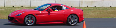 Cropped image of car on the race track