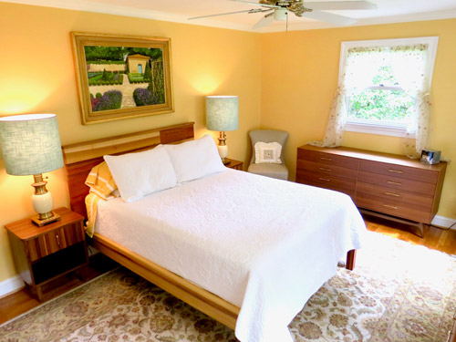 A full bedroom done in the mid-century modern style.