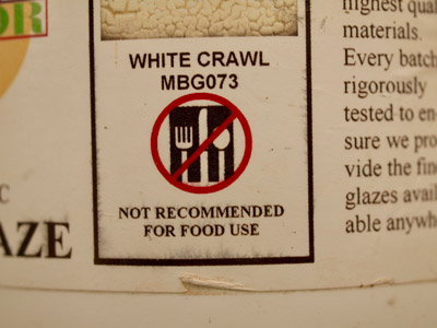 Ceramic glaze with label showing NOT SAFE for food